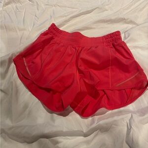 Lululemon Hotty Hot bright coral shorts, size 4, 2.5 inch
Looks red but is coral